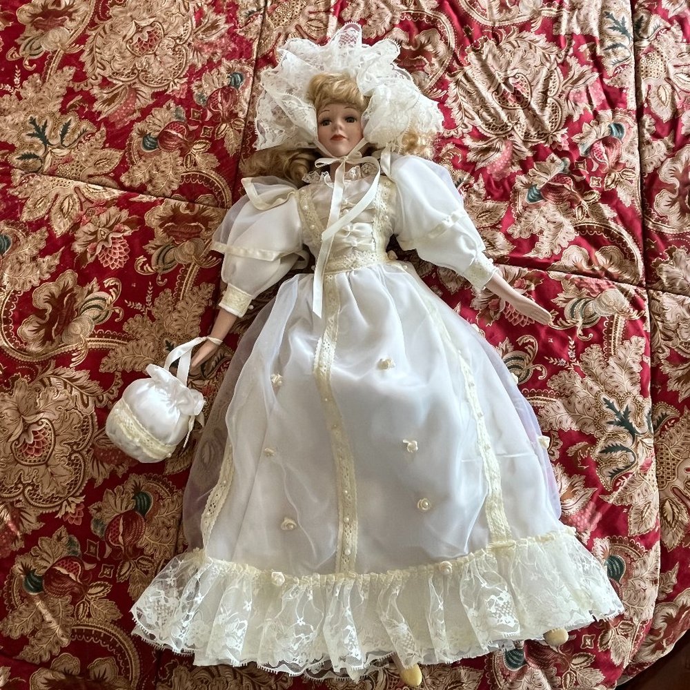 Victorian style doll dressed in white